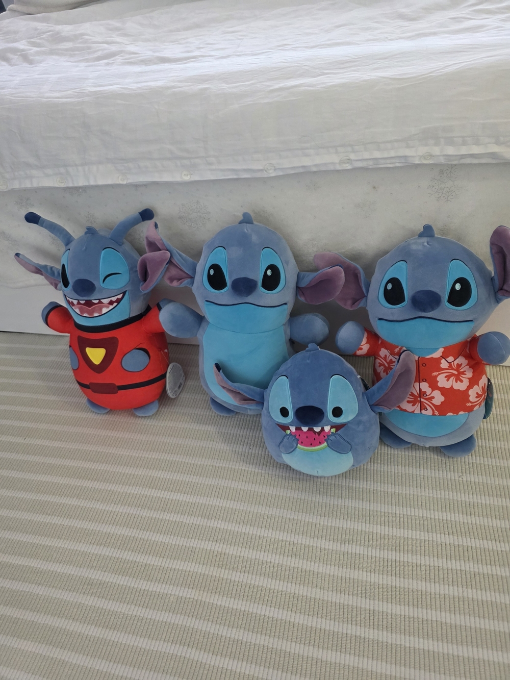 Disney Blue Stitch Plush Quartet with Red and Floral Outfits